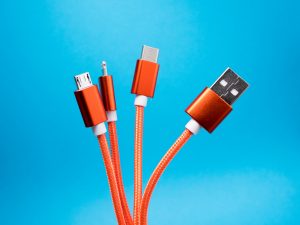 The digital bouquet of orange connector cables; image by Lucian Alexe, via Unsplash.com.