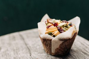 Just an over the top carrot cake muffin; image by Melissa Walker Horn, via Unsplash.com.