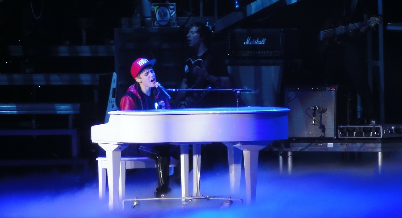 Justin Bieber singing at a show