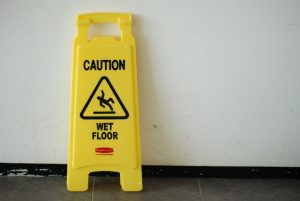 Yellow "Caution Wet Floor" sign; image by adpeople0, via Pixabay.com.