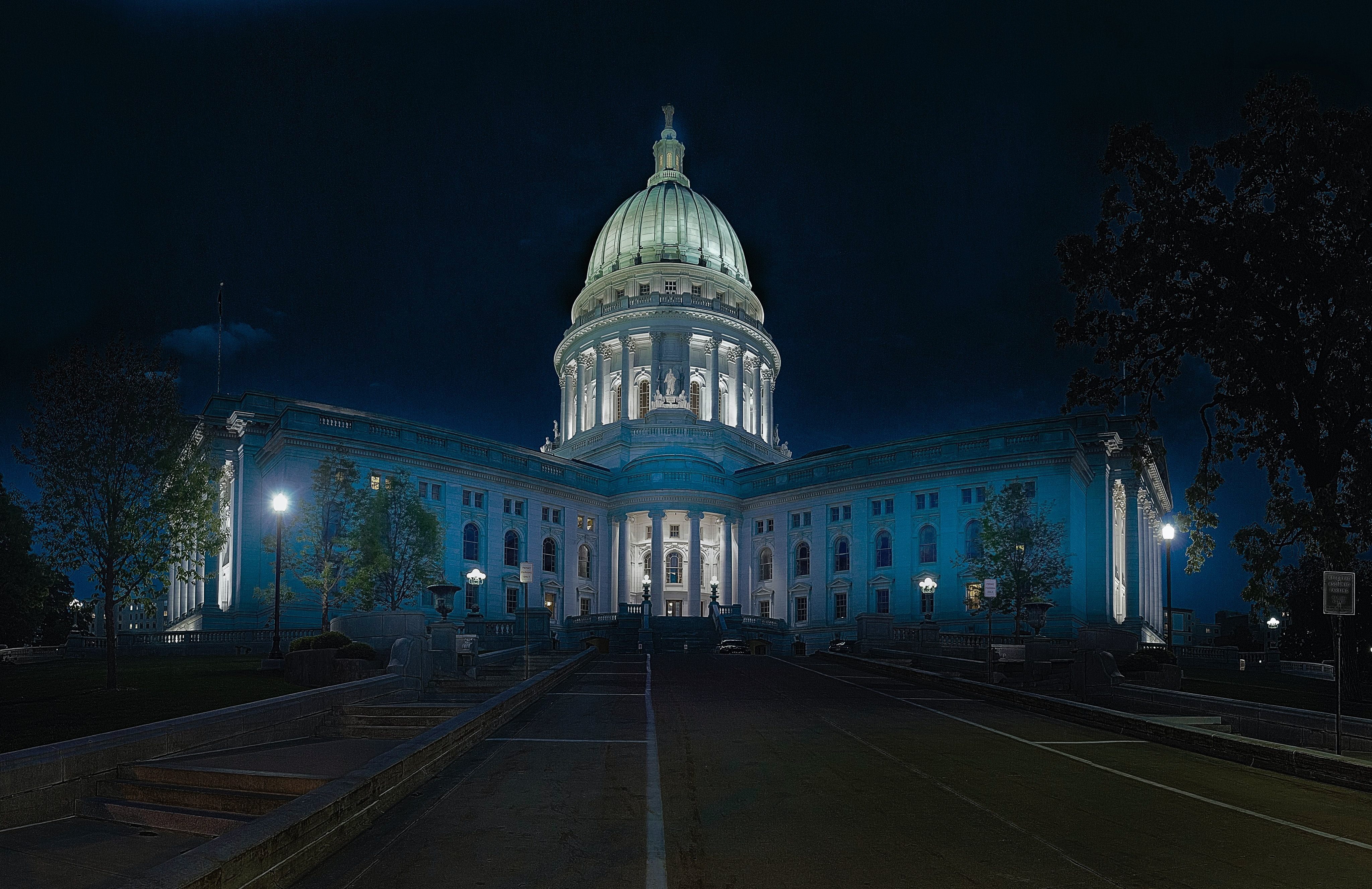 Capitol building at night; image by Michael, via Unsplash.com.