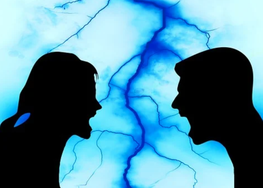 Silhouettes of a man and woman arguing against a blue background; image by Geralt, via Pixabay.com.