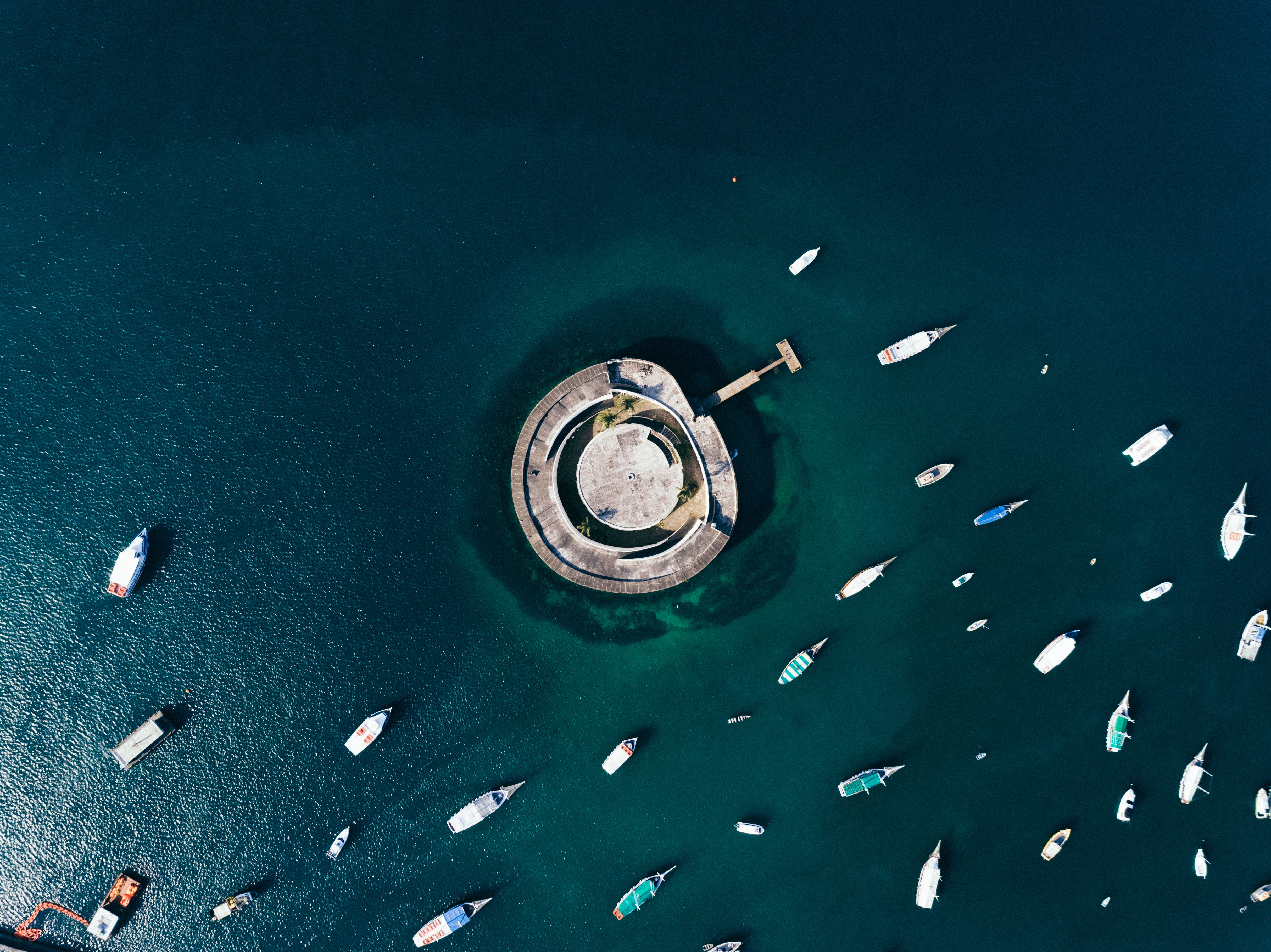 Many boats on the water (aerial view), São Marcelo Fort, Brazil; image by Felipe Dias, via Unsplash.com.