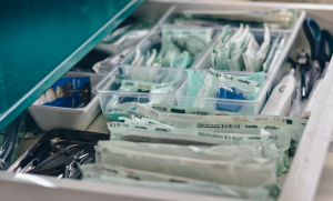 Medical supplies on a tray; image by Ibrahim Boran, via Unsplash.com.