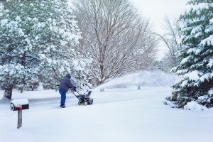 Person snowblowing