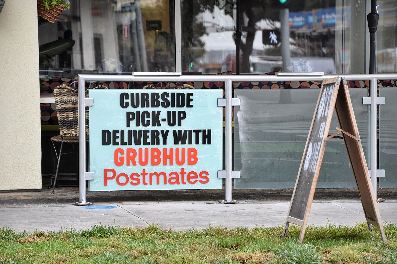 Postmate delivery sign