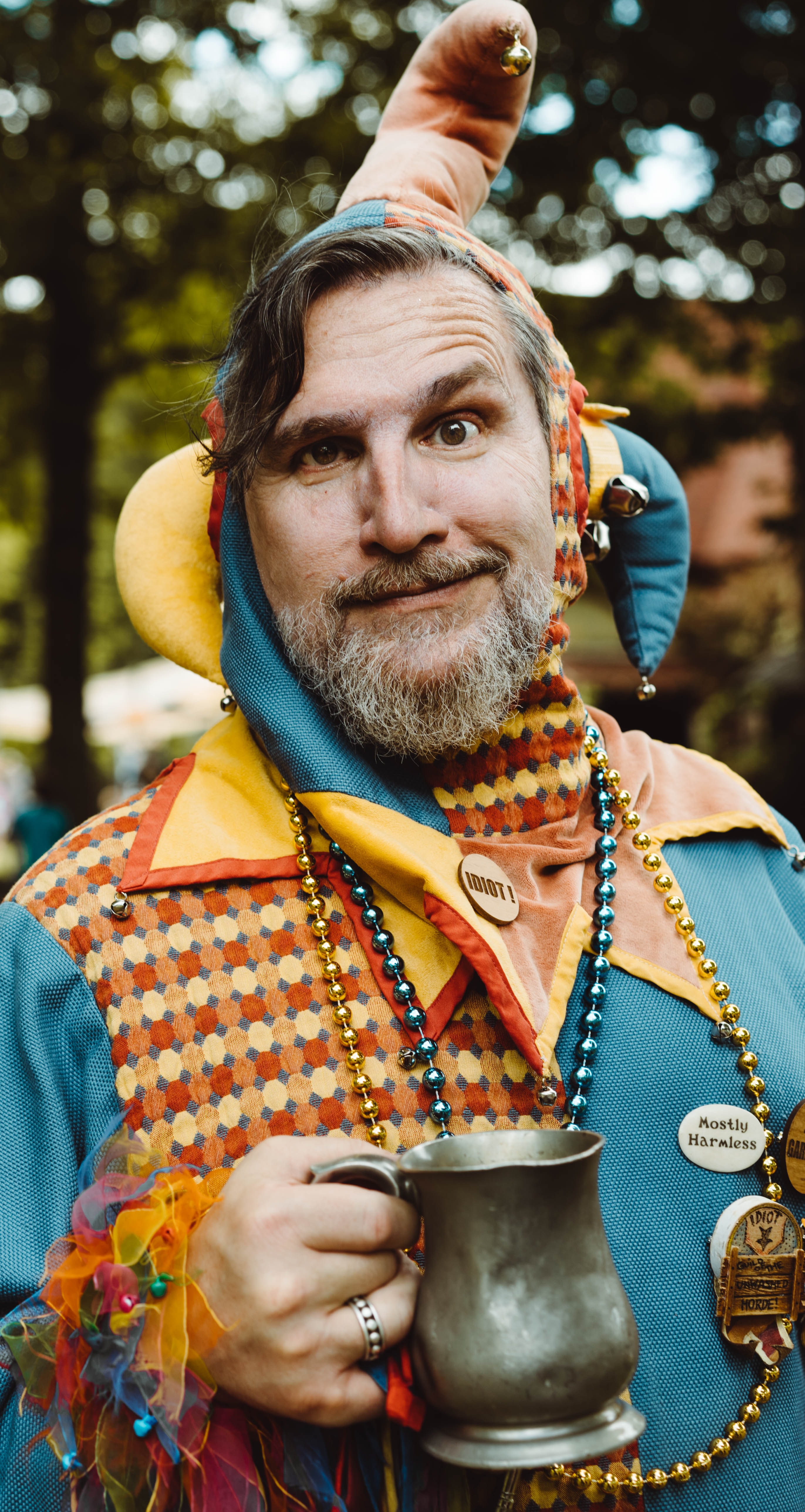 Man in jester costume; image by Austin Lowman, via Unsplash.com.