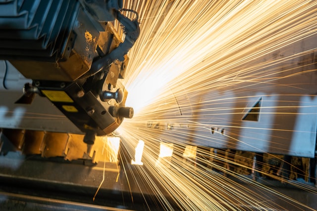 Machine and sparks; image by Clayton Cardinalli, via Unsplash.com.