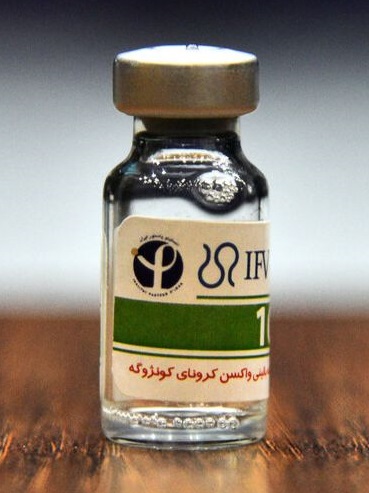 Vial of Cuban COVID vaccine with Persian-script label.