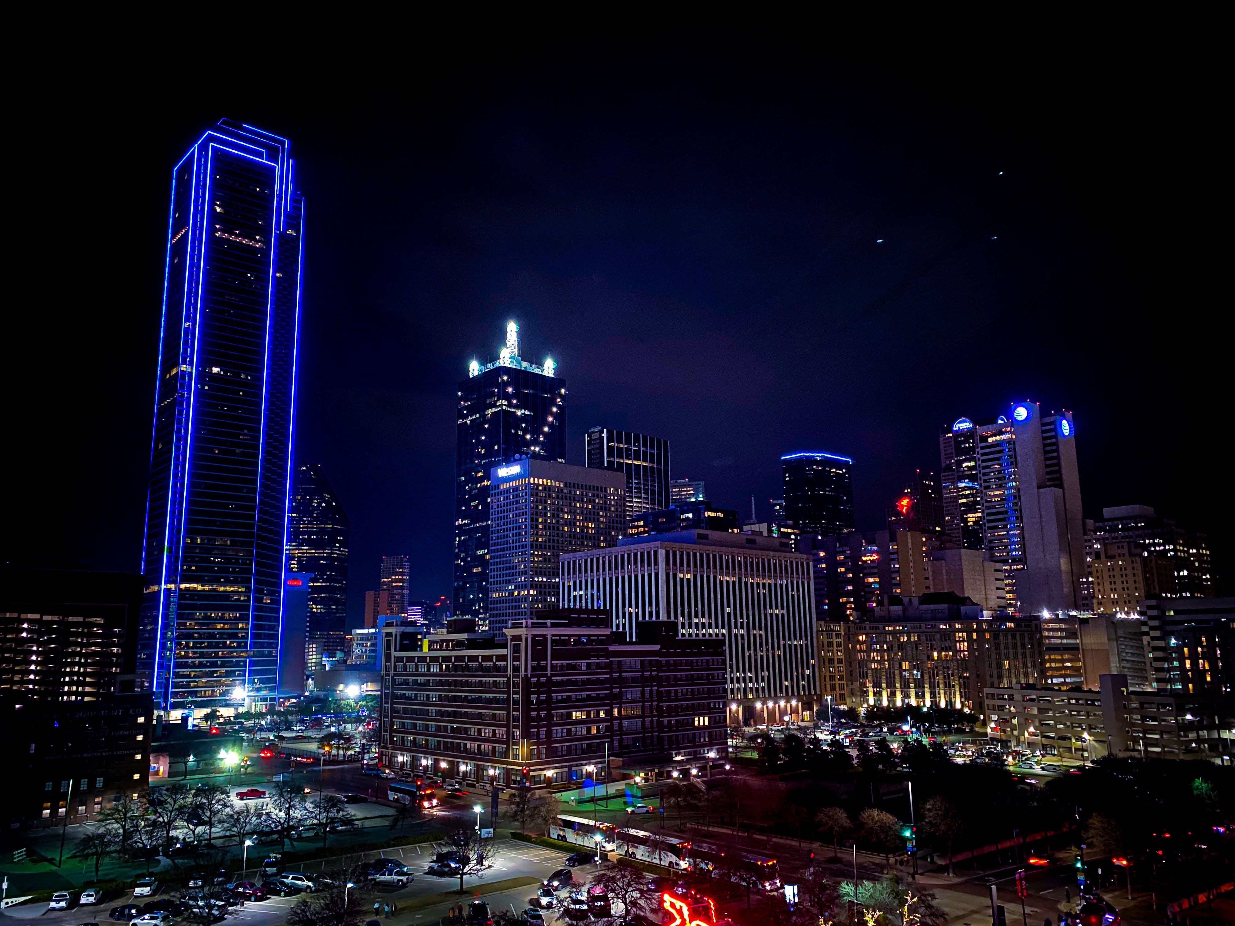 Downtown Dallas by night; image by Zack Brame, via Unsplash.com.