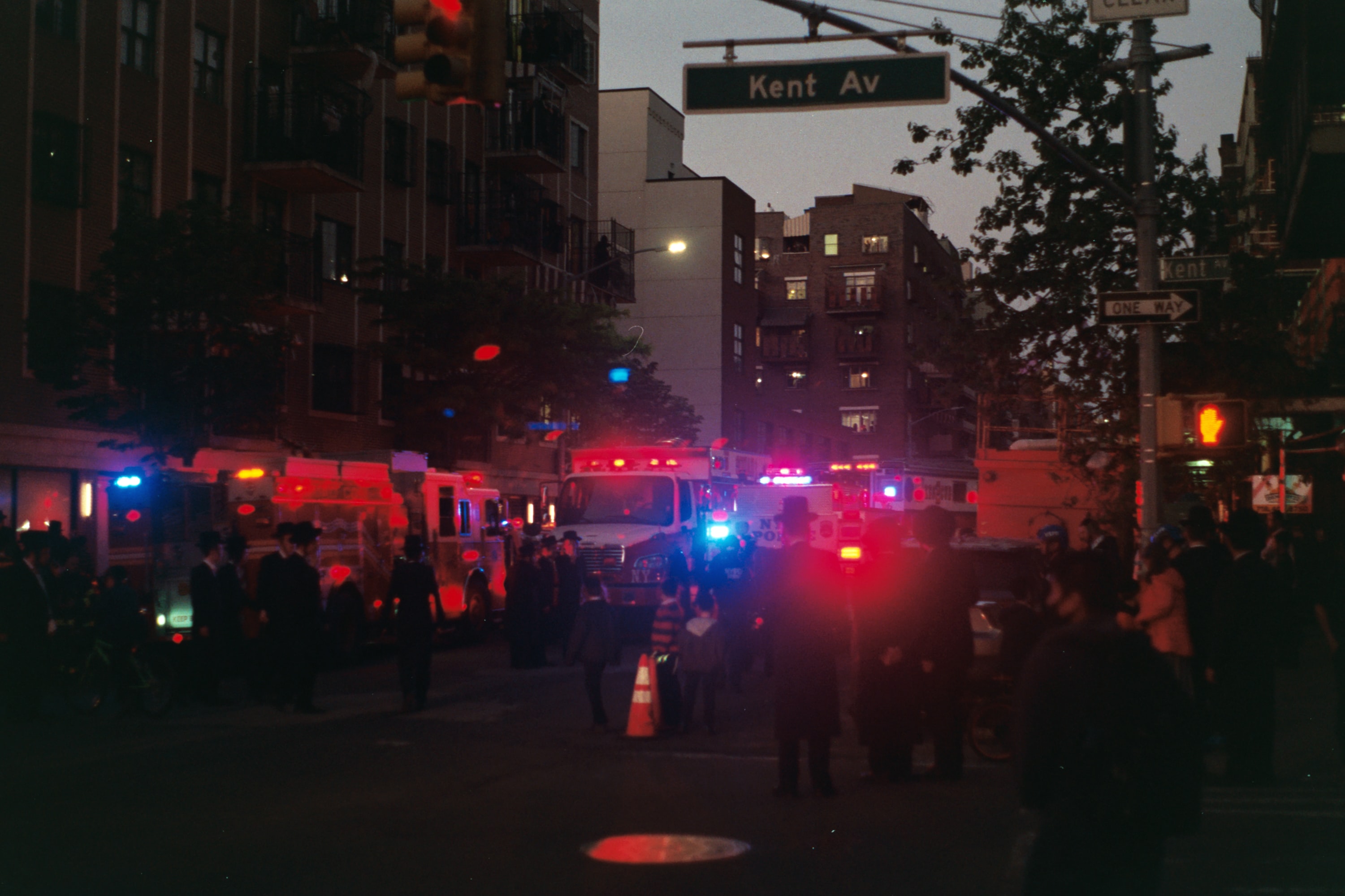 Emergency vehicles at night; image by Nate Isaac, via Unsplash.com.