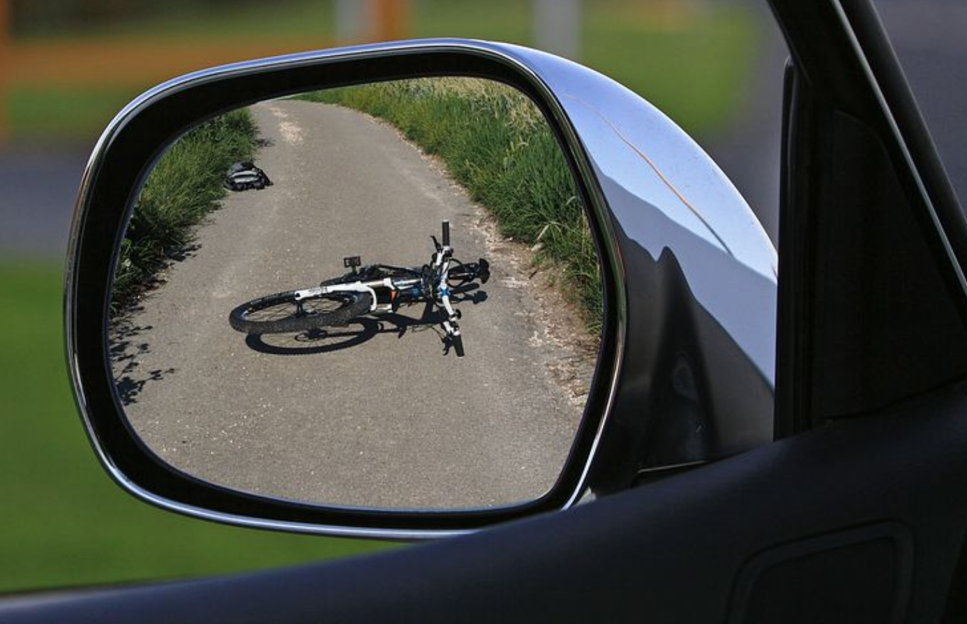 Fallen bike in side rearview mirror; image by Alexas_Fotos, via Pixabay.com.