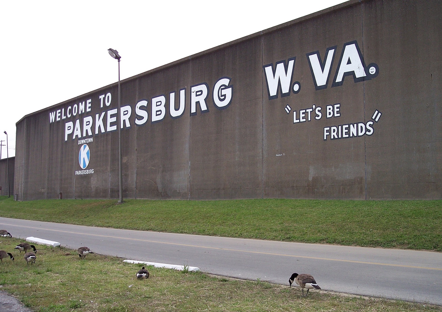 Welcome to Parkersburg, WV sign; image by Tim Kiser, with User Malepheasant, CC BY-SA 2.5, via Wikimedia Commons.