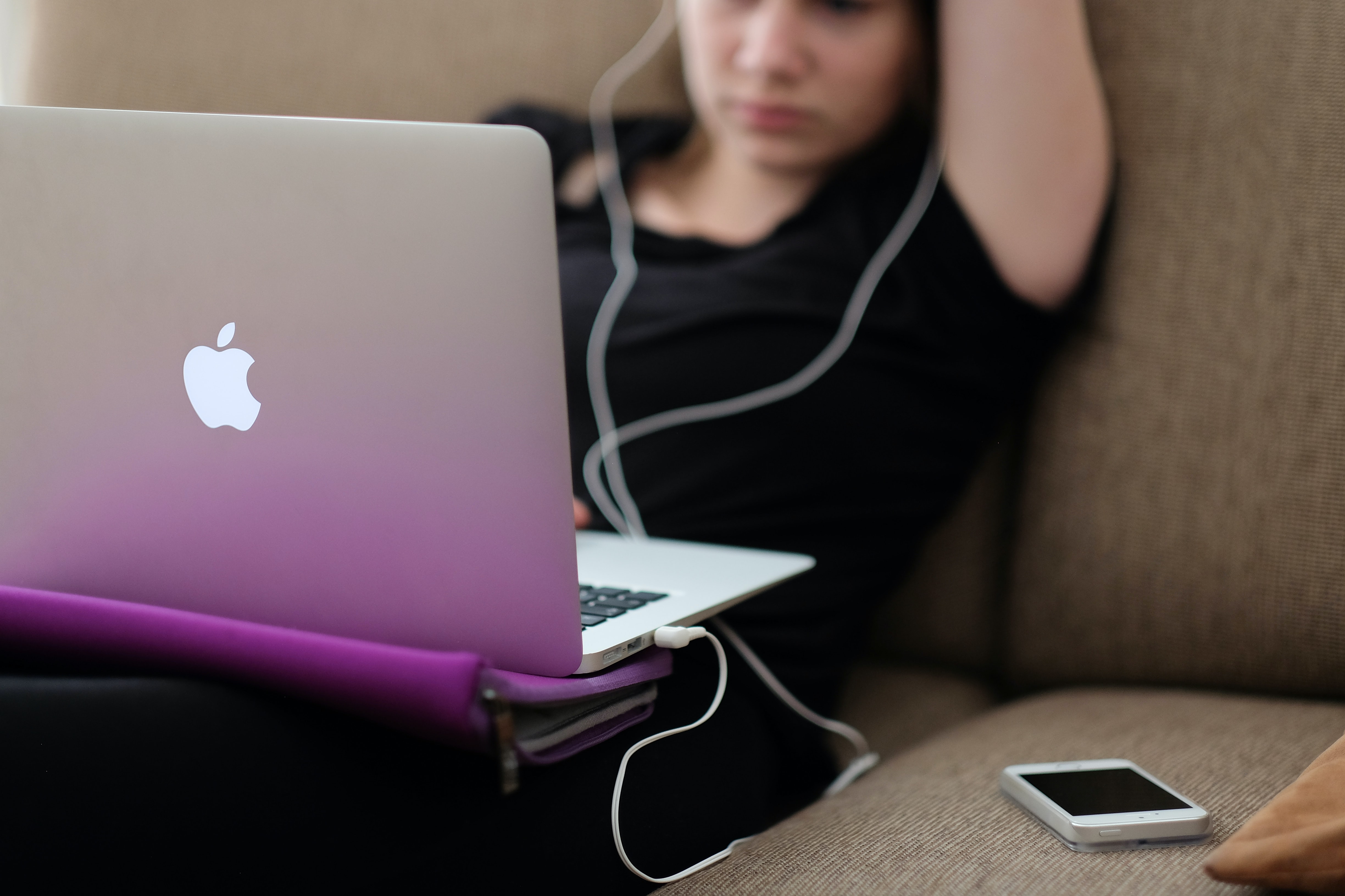 Woman with laptop; image by Steinar Engeland, via Unsplash.com.