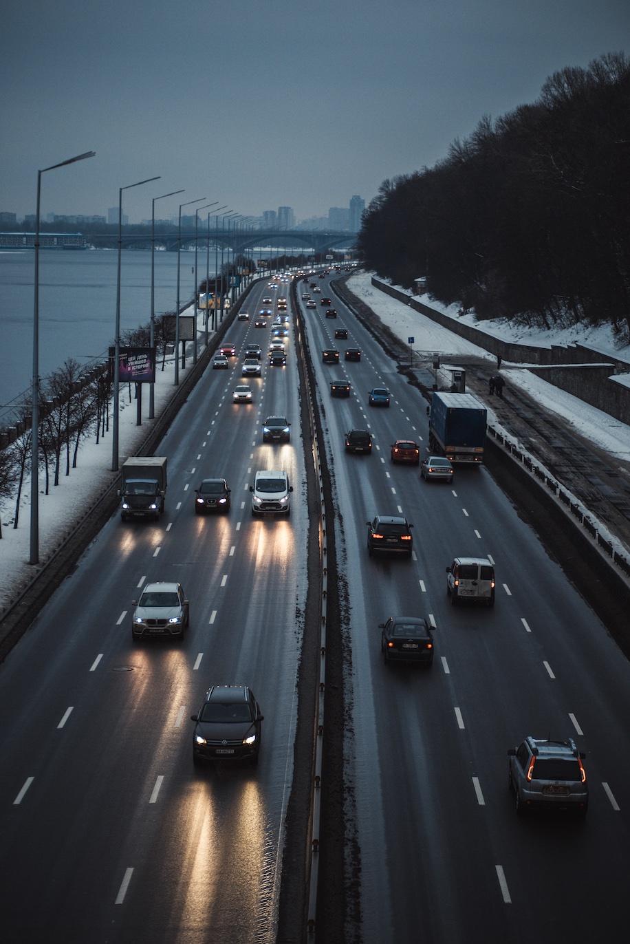 A highway along the Dnipro river, Kyiv, Ukraine; image by Nikola Markelov, via Unsplash.com.