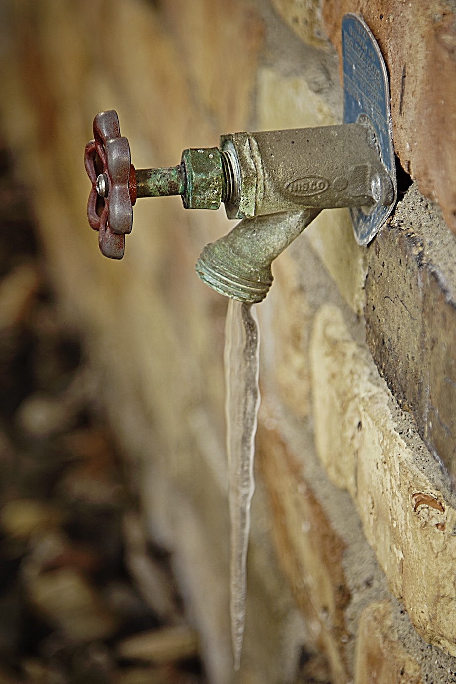 Frozen outdoor tap; image from Rawpixel.com, CCO Public Domain.