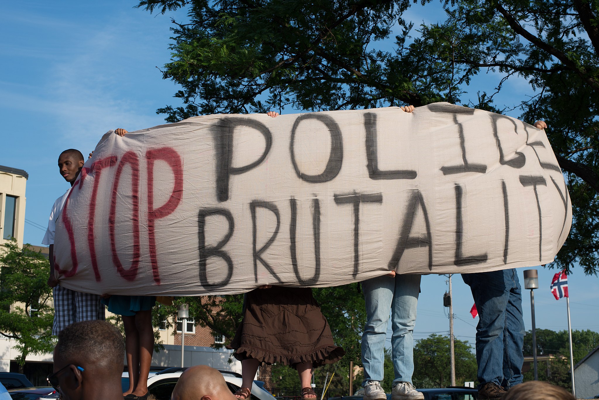 Protest against police brutality; image by Fibonacci Blue, CC BY 2.0, via Wikimedia Commons.