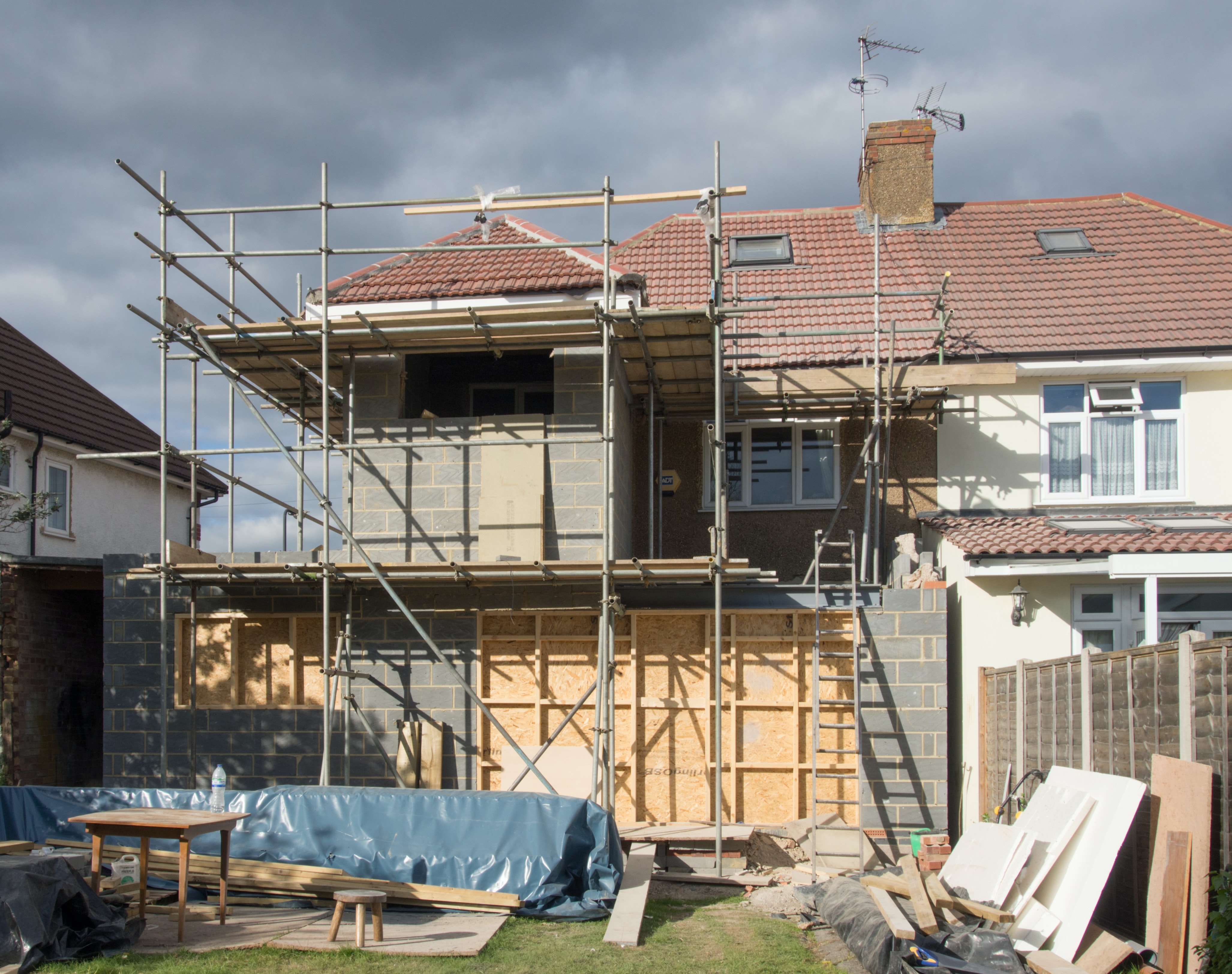 Scaffolding in front of home; image by Brett Jordan, Unsplash.com.