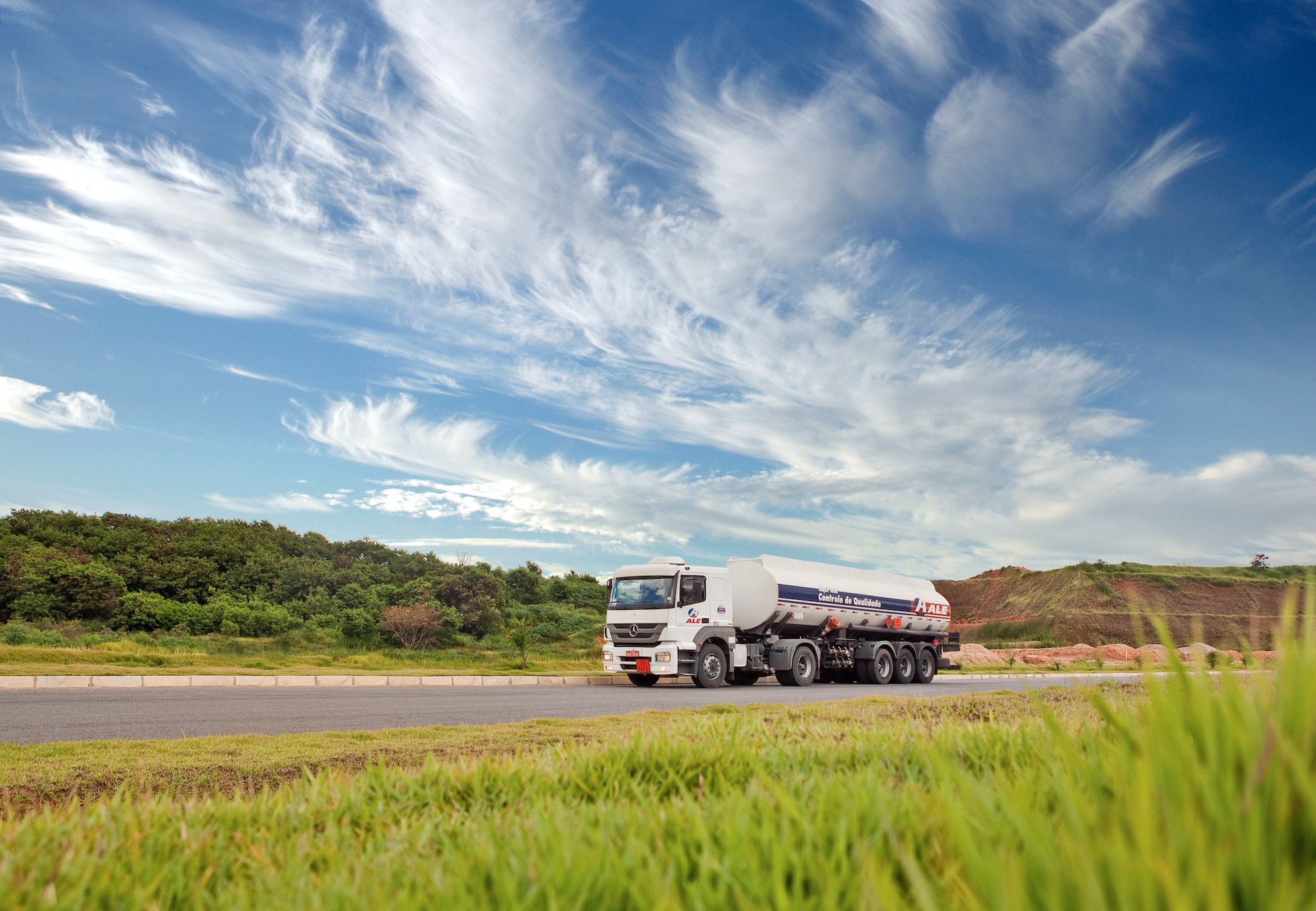 Tanker truck on road; image by Ale Sat, via Unsplash.com.