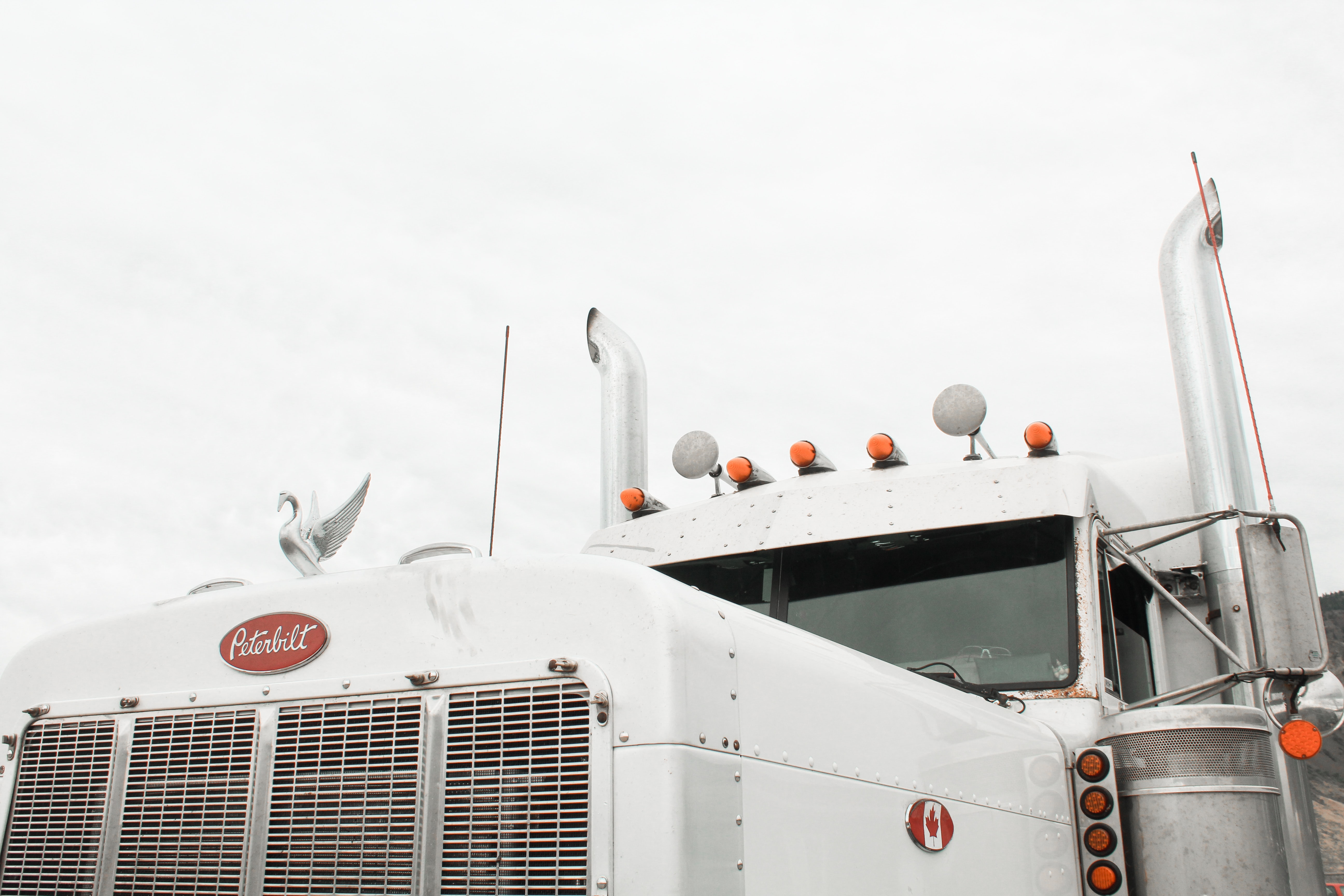 Upclose shot of front of truck; image by Chantal Cadorette, via Unsplash.com.