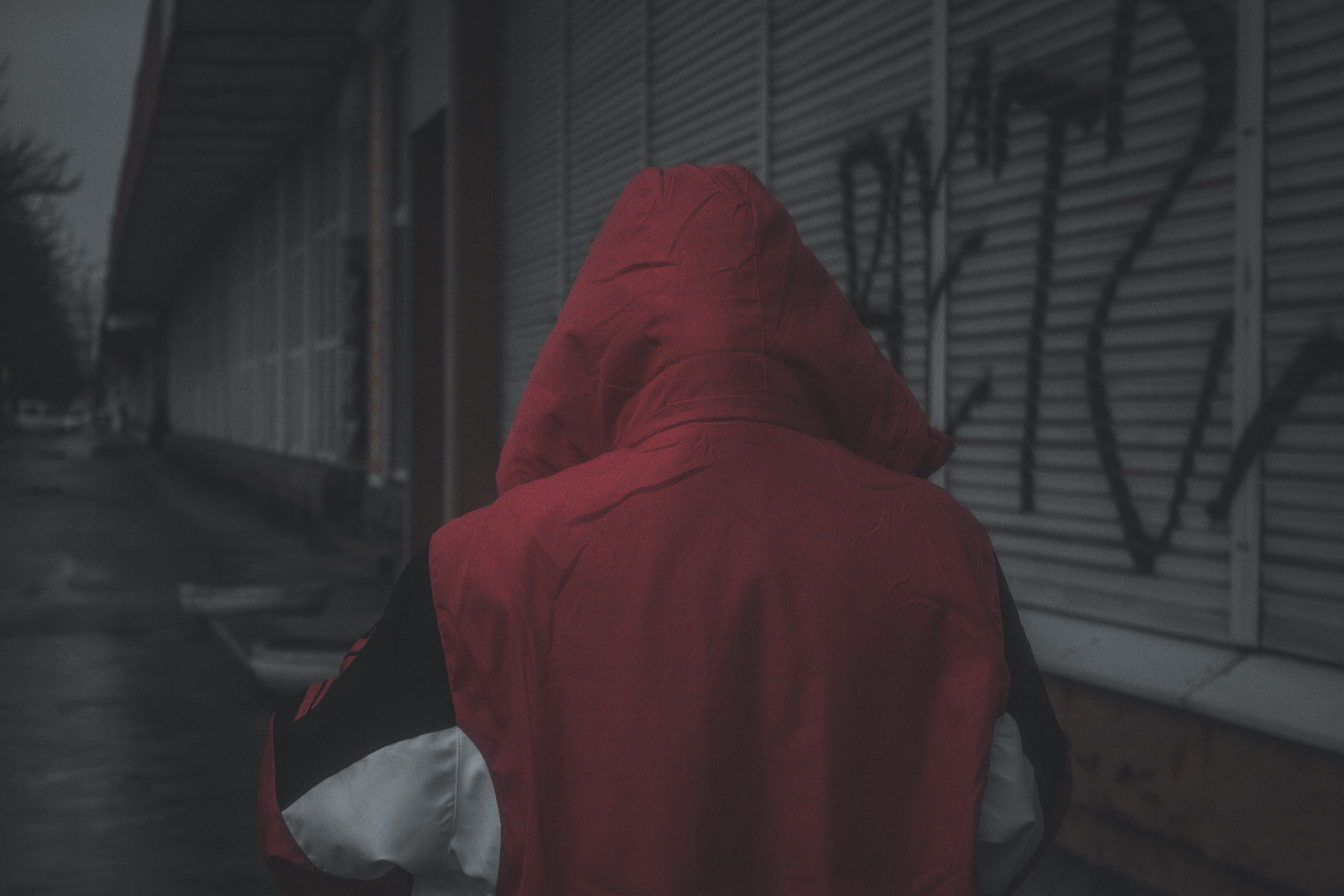 Young man in red hoodie; image by Vlad, via Unsplash.com.