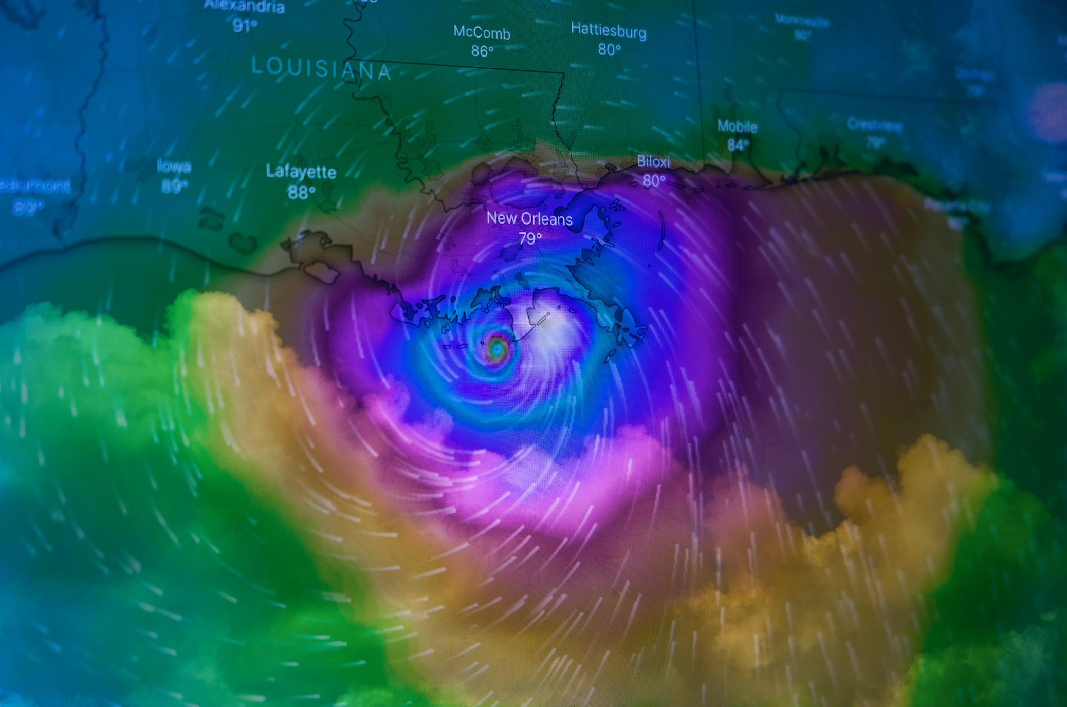 Double exposure of Hurricane Ida approaching New Orleans on August 29, 2021; image by Brian McGowan, via Unsplash.com.