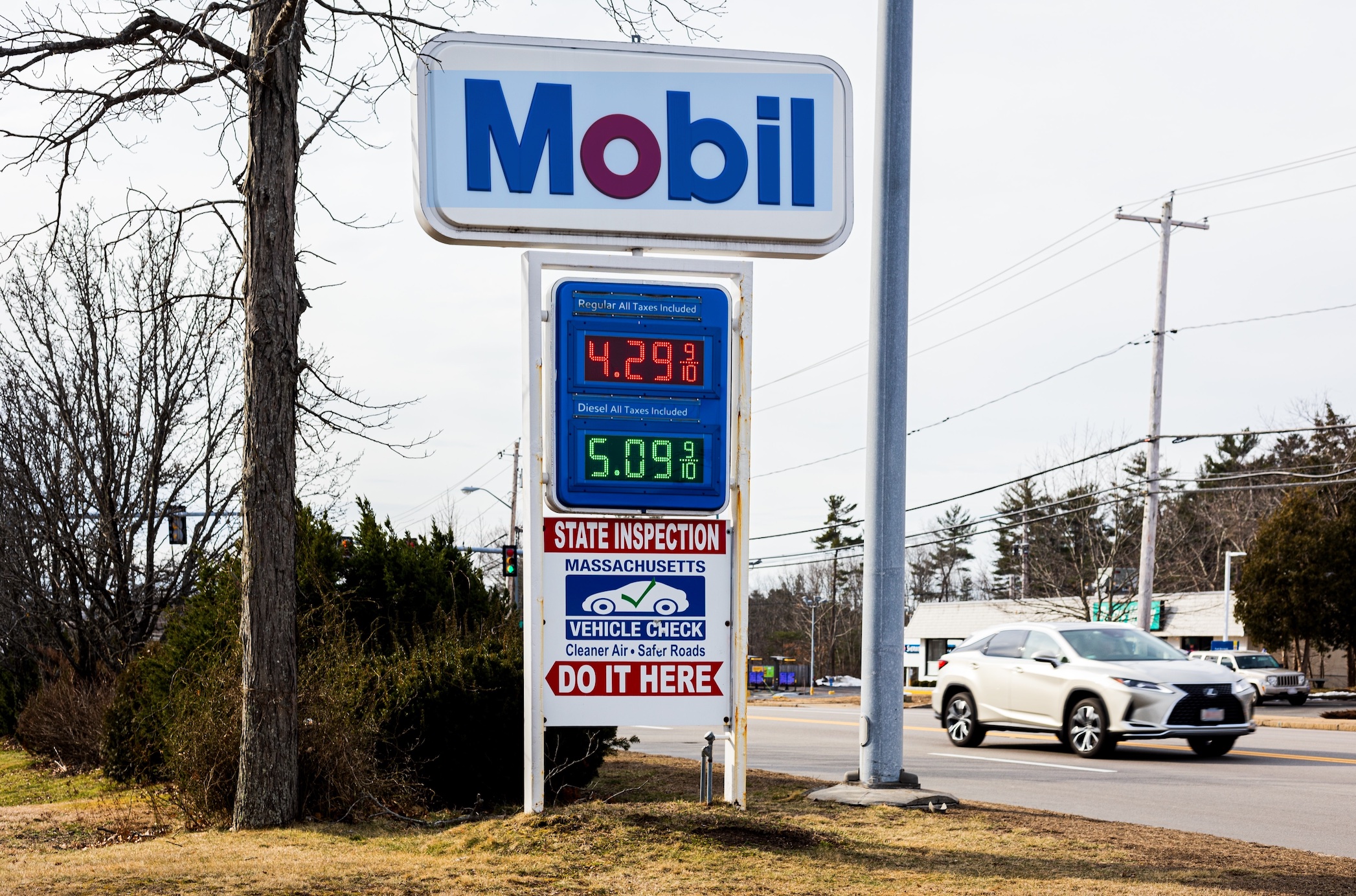 Mobil Gas sign showing gas prices; image by Yassine Khalfalli, via Unsplash.com.