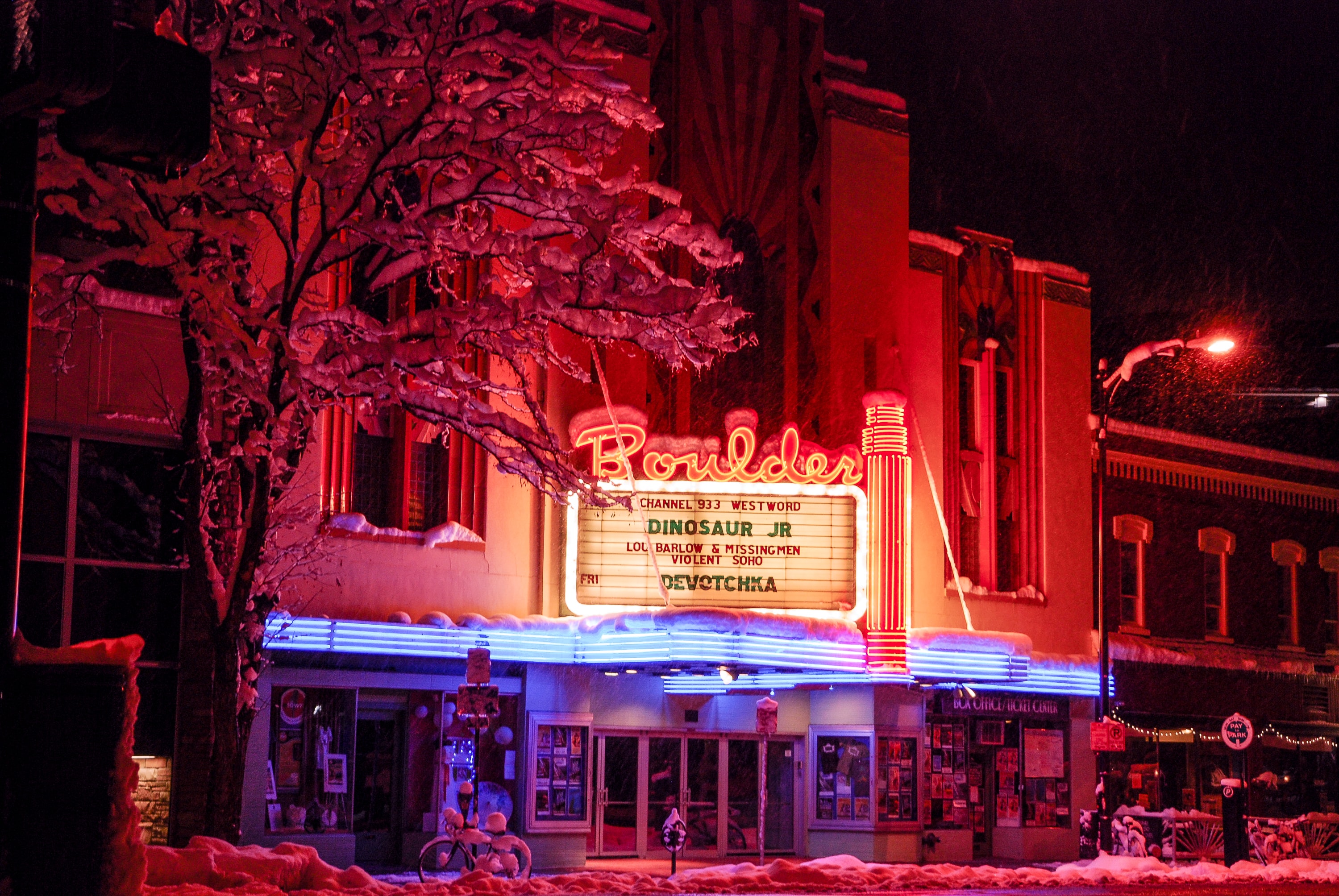 Movie theatre marquee on a winter night; image by Simon Goetz, via Unsplash.com.