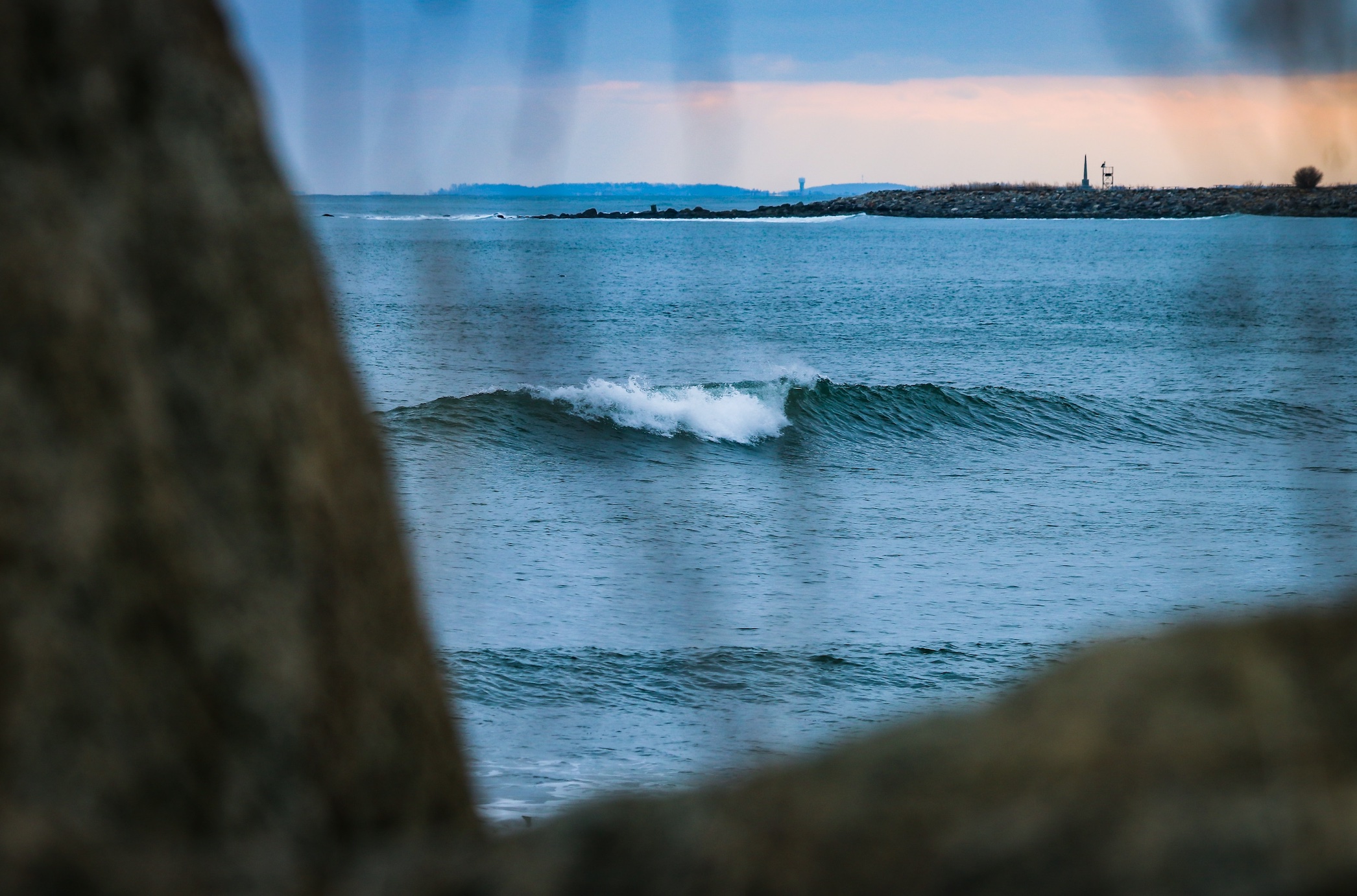 Waves offshore; image by Brian Yurasits, via Unsplash.com.