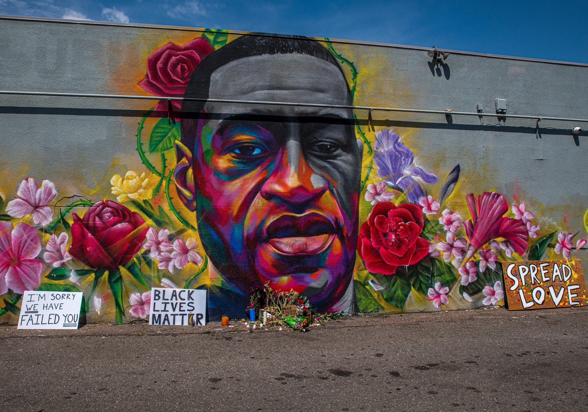 Mural of George Floyd at Colfax Avenue and Race St., Denver, Colorado; image by Mana5280, via Unsplash.com.