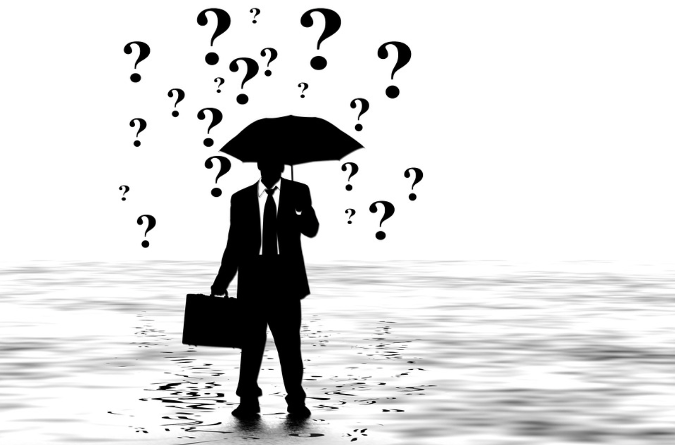 Silhouette of man with briefcase and umbrella in the rain; image by Geralt, via Pixabay.com.
