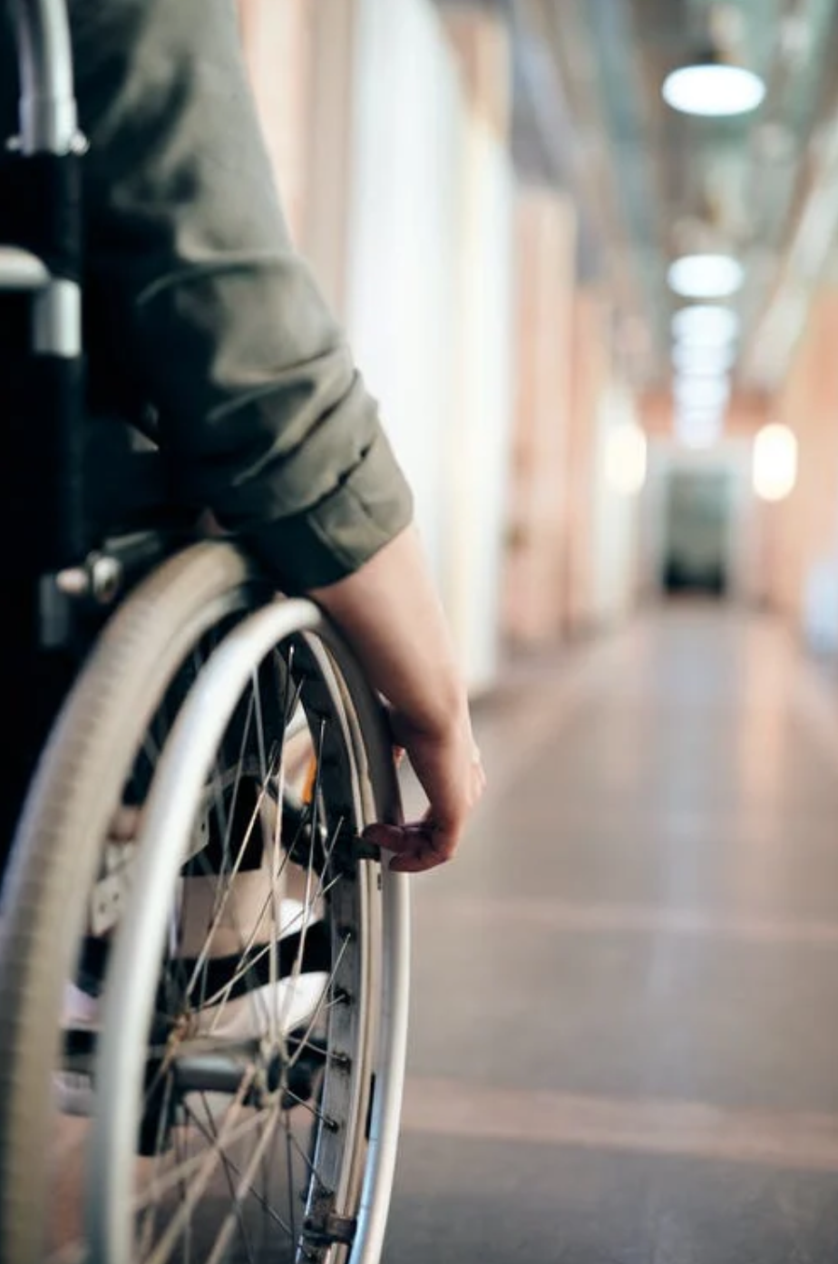Person in wheelchair; image by Marcus Aurelius, via Pexels.com.