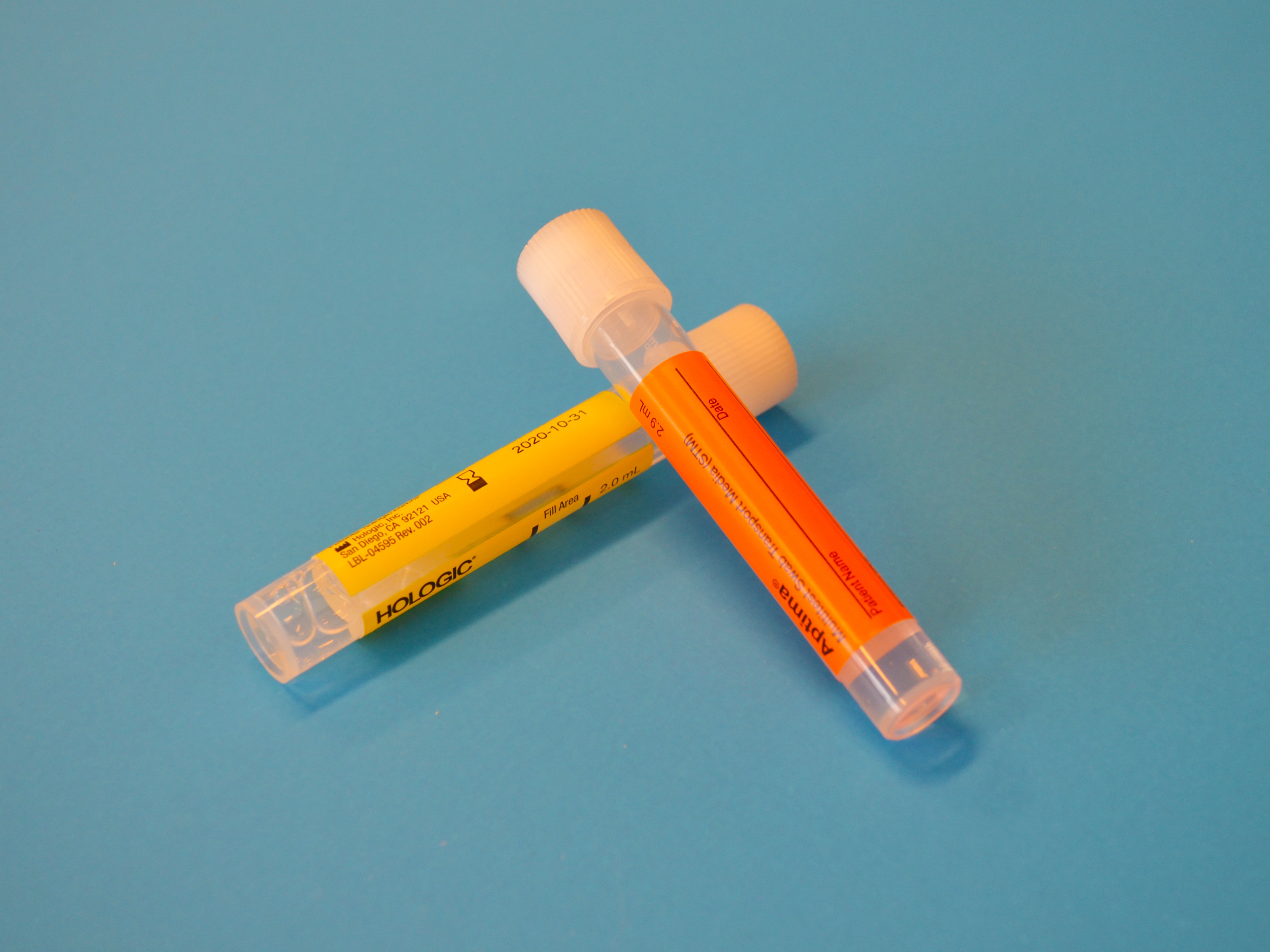 Transport tubes for urine and swabs. Hologic Aptima. Laboratory testing; image by Testalize.me, via Unsplash.com.