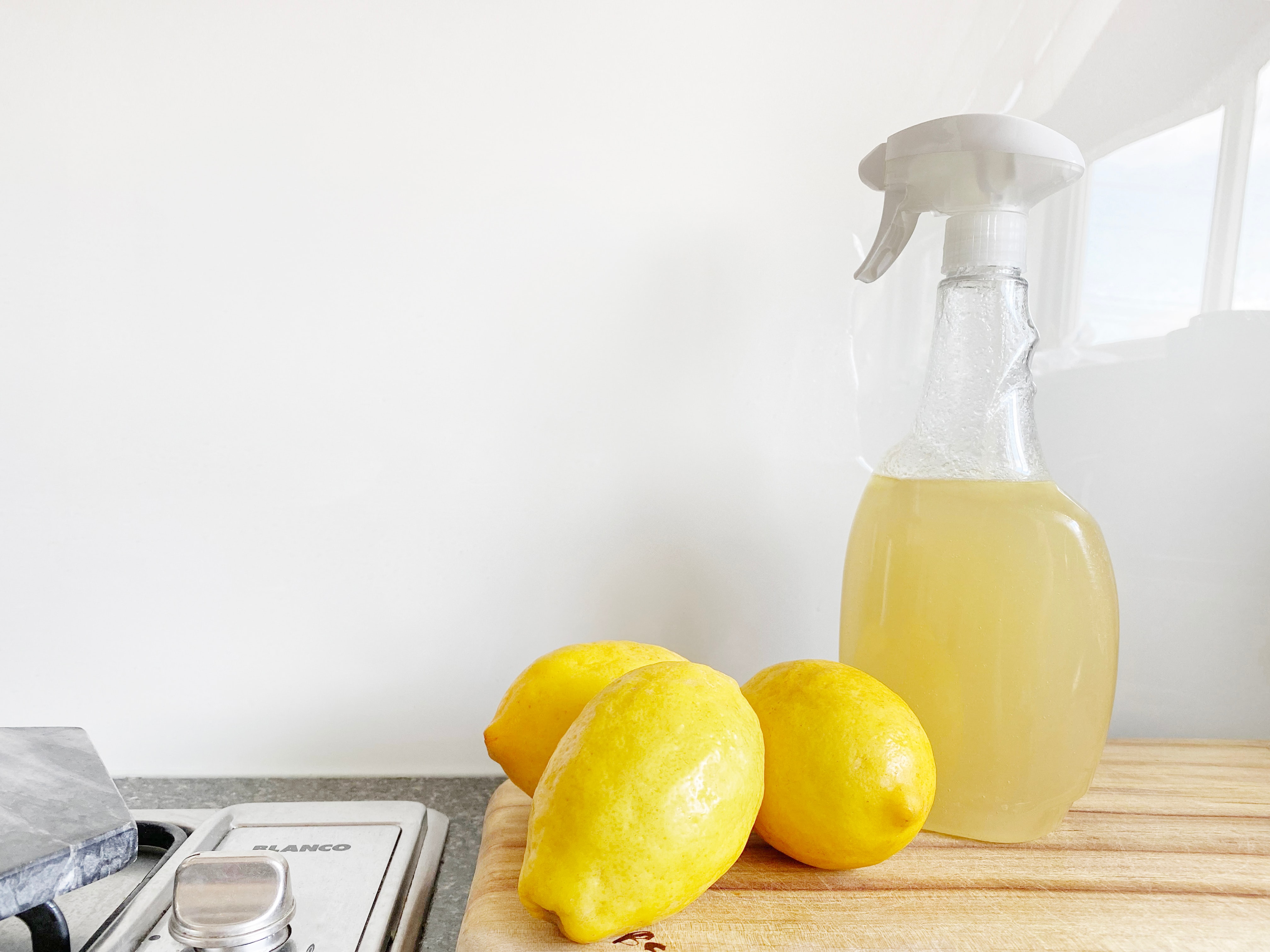 Homemade citrus peel & vinegar multi-purpose cleaner; image by Precious Plastic Melbourne, via Unsplash.com.