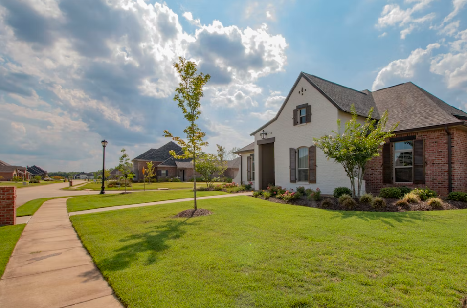 Two-story home in subdivision; image by Ronnie George, via Unsplash.com.