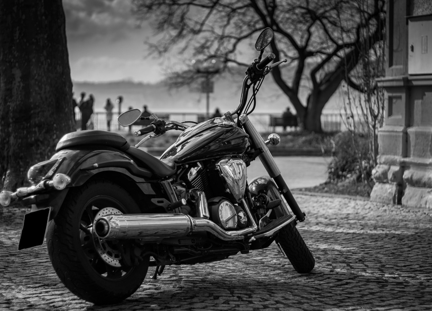 Black and white still of motorcycle; image by LN Photoart, vie Pixabay.com.