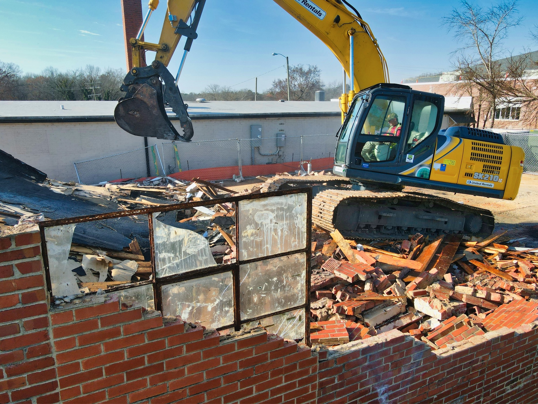 Building is demolished in downtown Pittsboro to make room for a new two story venue as part of the SoCo project. Image by Gene Gallin, via Unsplash.com.