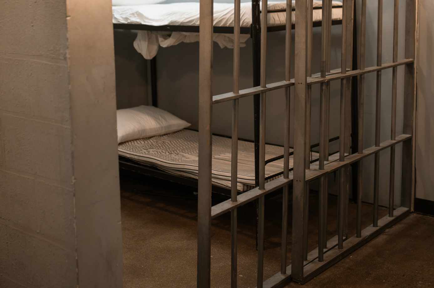 Empty jail cell; image by RODNAE Productions, via Unsplash.com.