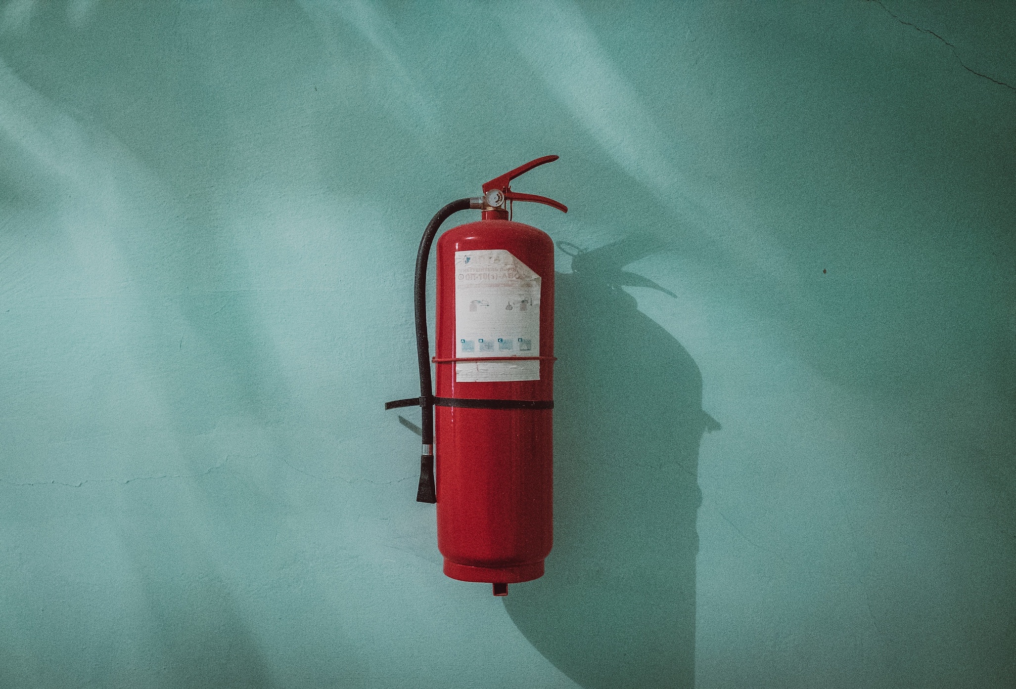 Fire extinguisher; image by Piotr Chrobot, via Unsplash.com.