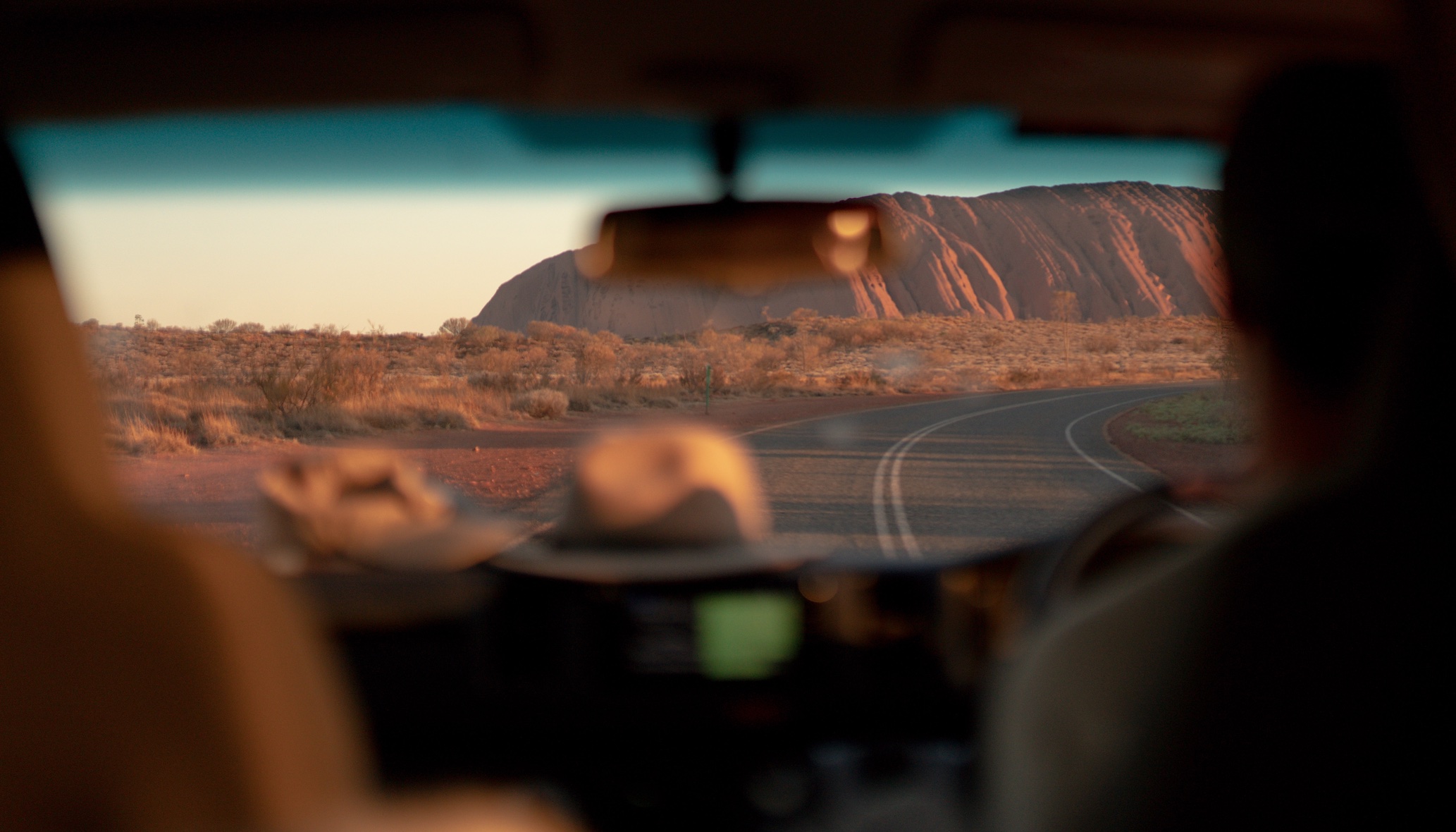 Driving to Uluru; image by Finn, via Unsplash.com.