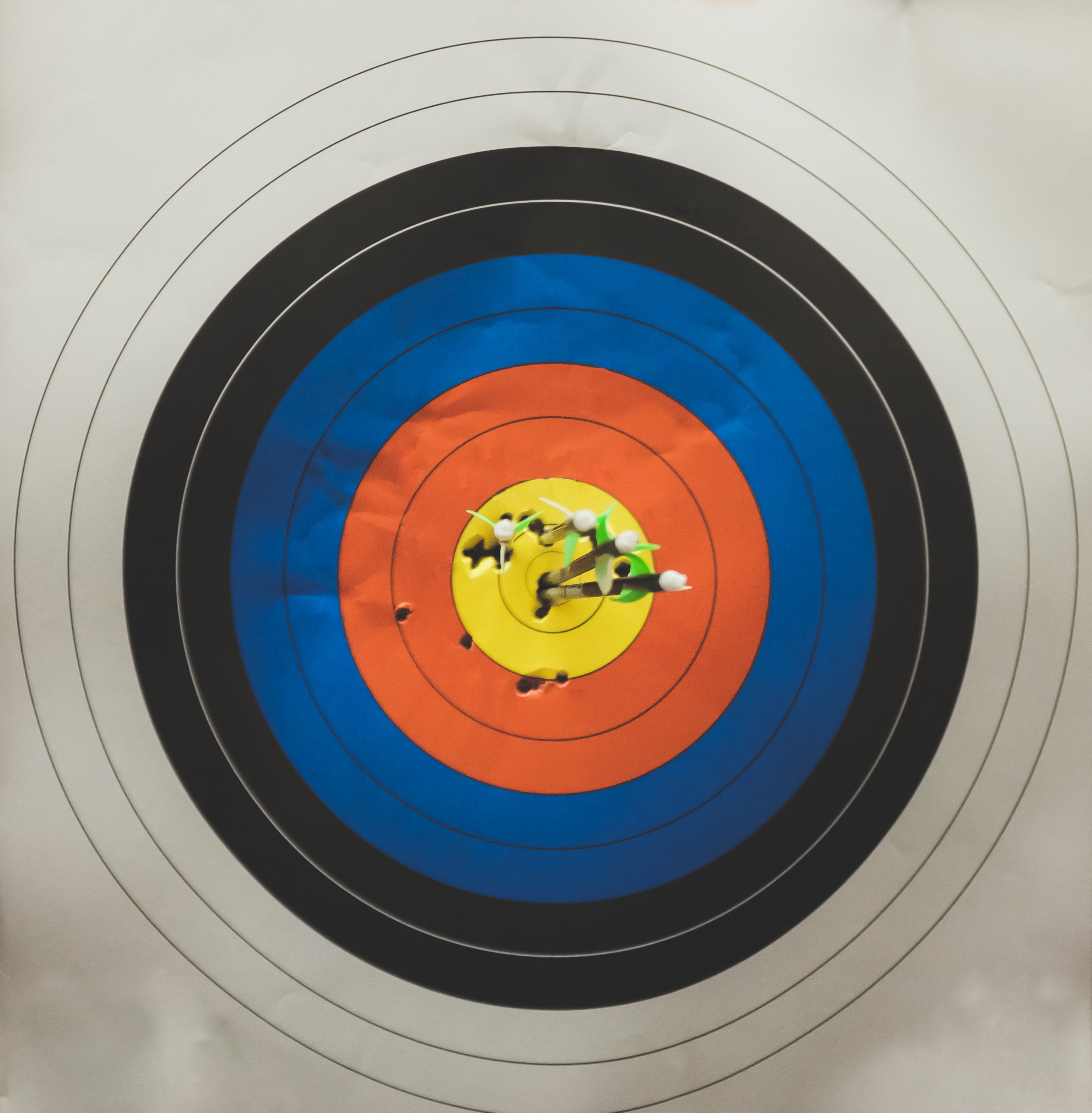 Target with multiple arrows in it; image by Kenny Eliason, via Unsplash.com.