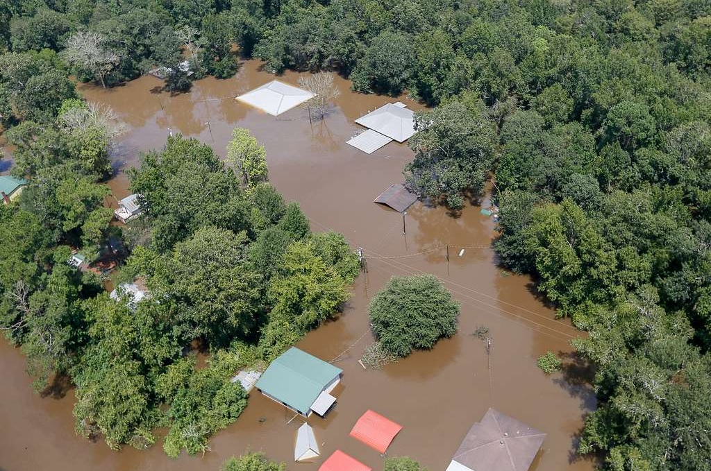 Overhead view of a residential area with extreme flooding.