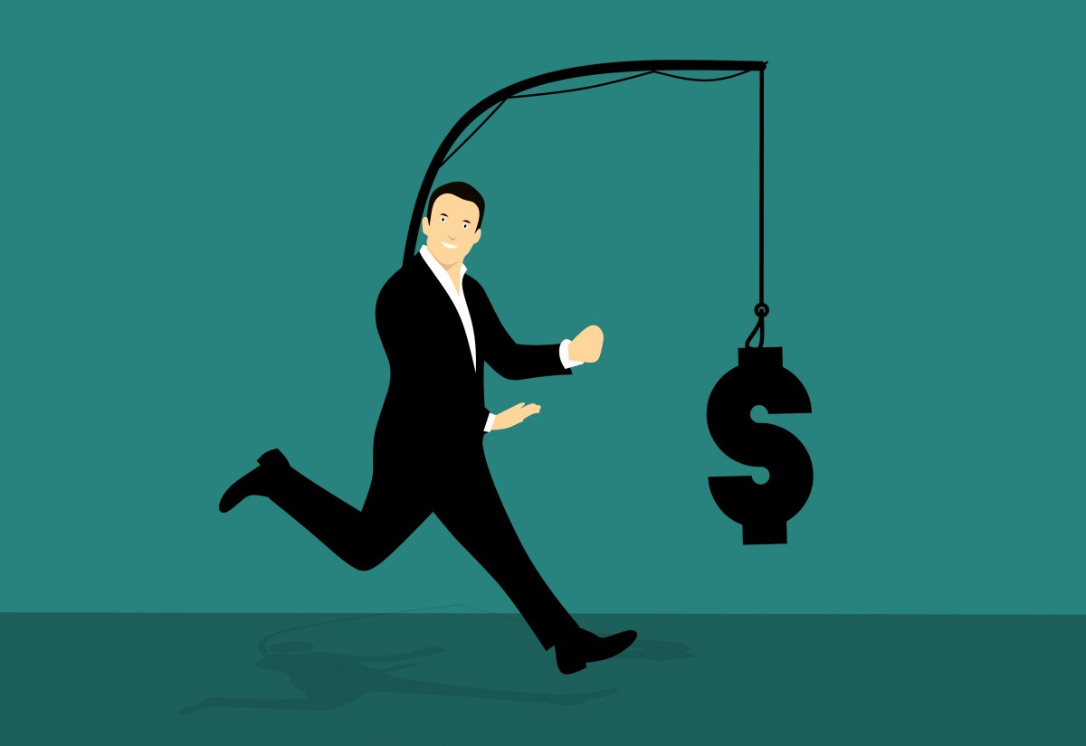 A cartoon image of a man chasing after a dollar sign which is being dangled in front of him.