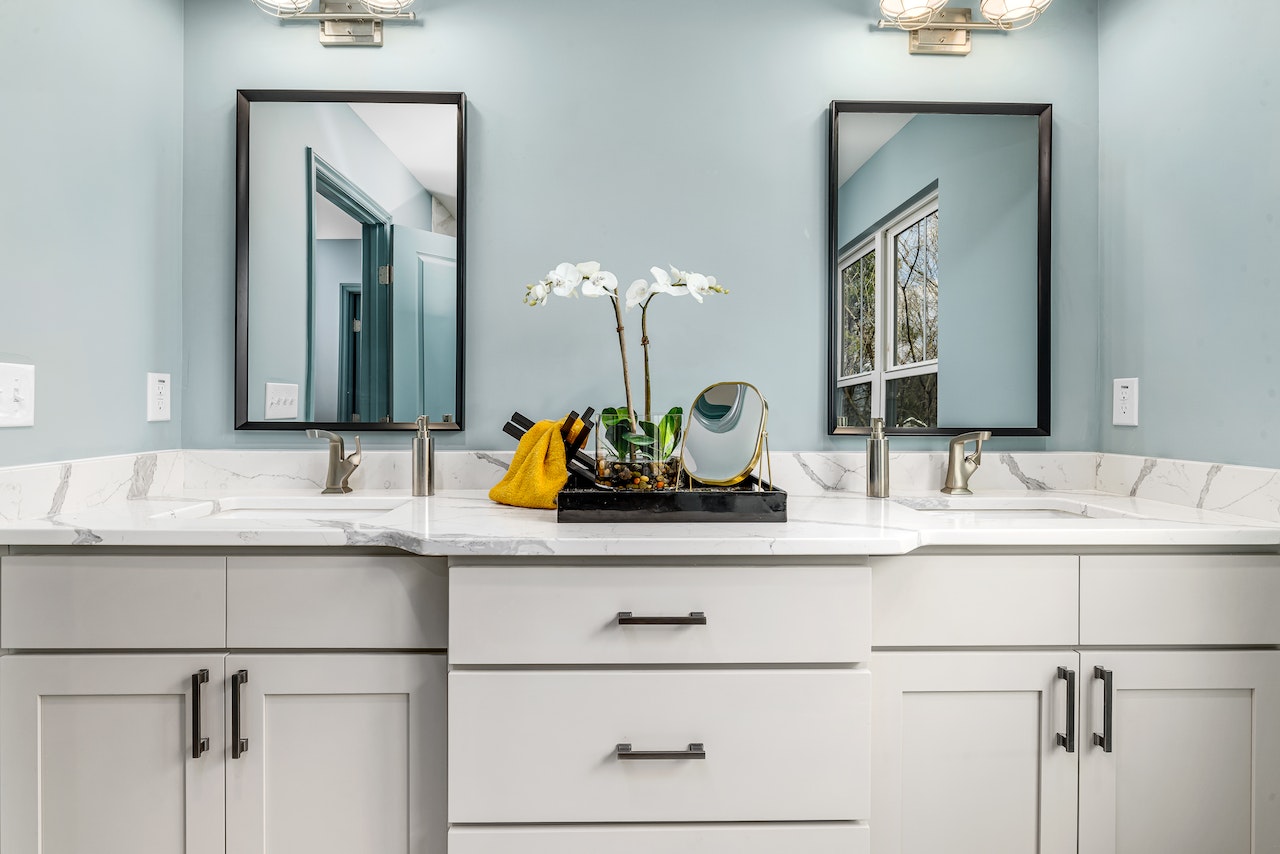 Bathroom vanity with marble top; image by Curtis Adams, via Pexels.com.