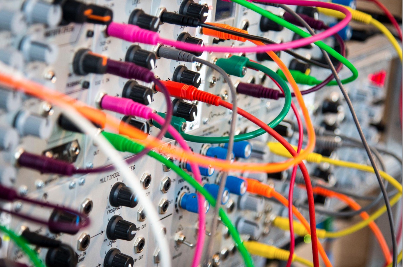 Assorted electrical cables; image by John Barkiple, via Unsplash.com.