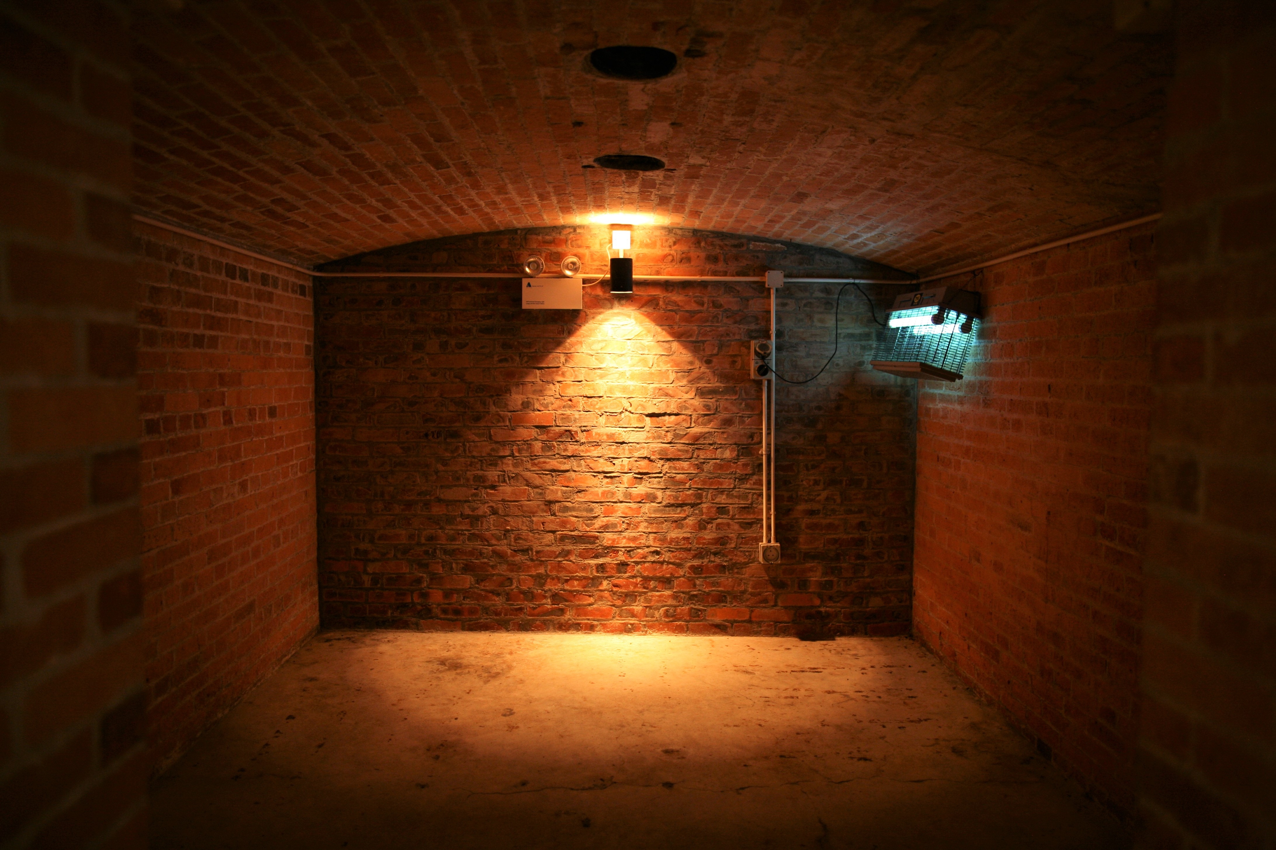 Brick room with dead end; image by Kdwk Leung, via Unsplash.com.