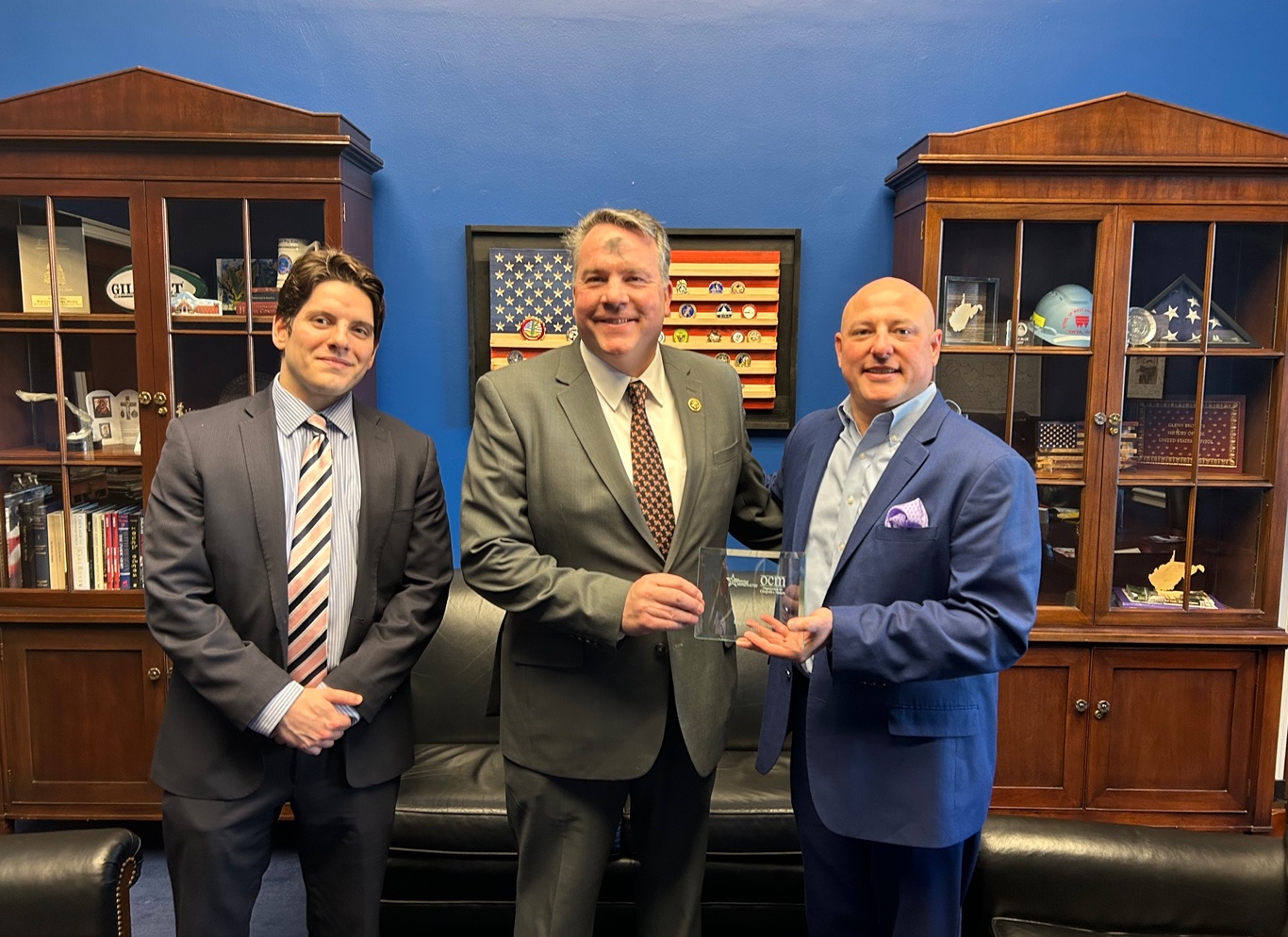 CMA President & CEO and OCM Board Secretary, Marty Irby, presents the Competitive Markets Legislator of the Year Award to Rep. Alex Mooney, R-WV, alongside CMA Director of Government Affairs, Vinnie Trometter, on Ash Wednesday 2024.