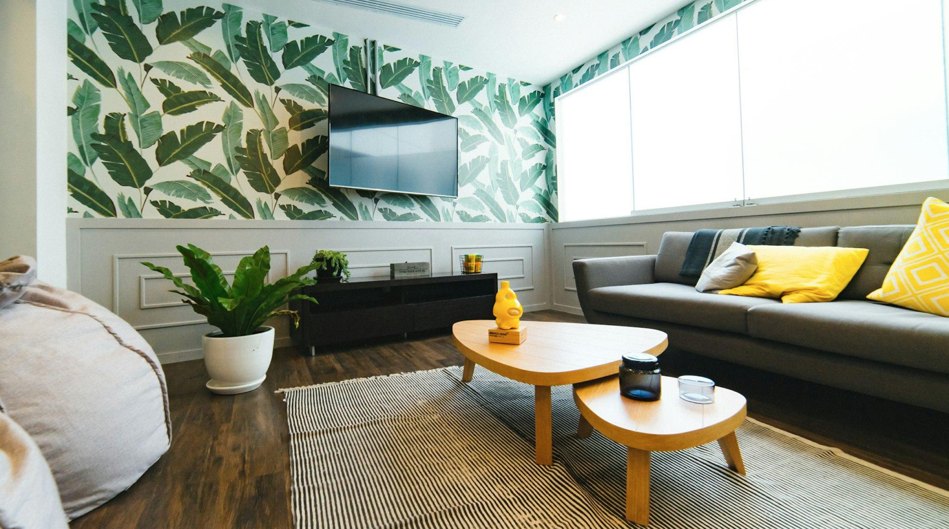 Photo of relaxing room with flat screen TV; image by Dan Gold, via Unsplash.com.