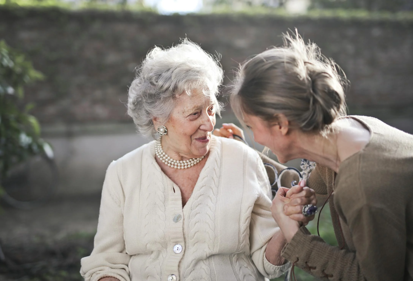 Two adult women beside each other; image by Andrea Piacquadio, via Pexels.com.