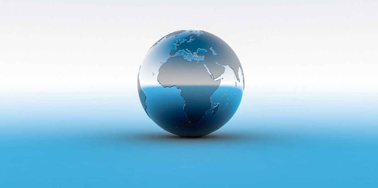 Globe of the Earth on a gradient white to blue background; image by qimono, via Pixabay.com.